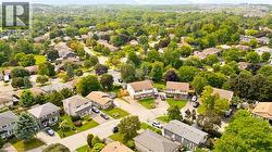 Residential area with established landscaping and mature trees - 