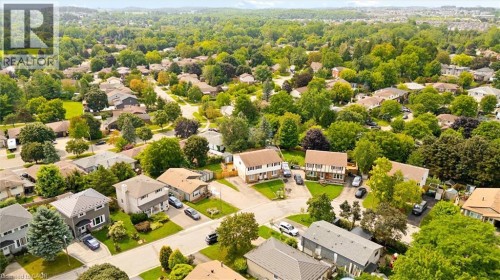 Residential area with established landscaping and mature trees - 76 Cluthe Crescent, Kitchener, ON 