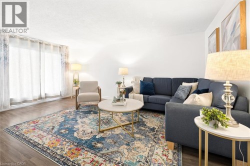 Wood-finish flooring with white wall finishes - 76 Cluthe Crescent, Kitchener, ON 