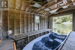 Rare to find in-water boat house - 