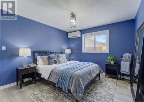 Main floor bedroom 3 AI staged - 136 Dunsmere Drive, Kitchener, ON 
