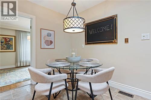 Eat in Kitchen with Doors to Dining Room - 1529 Wembury Road, Mississauga, ON 