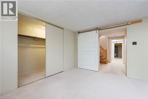 Off Season Storage Closet and Barn Door to Hallway - 1529 Wembury Road, Mississauga, ON 