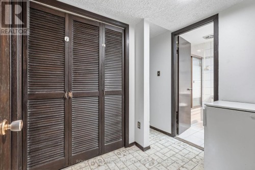 lower level large closet and hallway - 60 Bowshelm Court, Mississauga, ON 