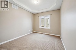 Recessed lighting and a tray ceiling - 