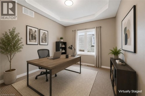 Recessed ceiling with an overhead light fixture, single window with curtains, and wall-to-wall carpeting - 426 Hidden Creek Drive, Kitchener, ON 