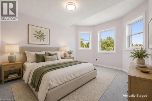 Neutral wall tones, recessed lighting, and multiple windows - 426 Hidden Creek Drive, Kitchener, ON 