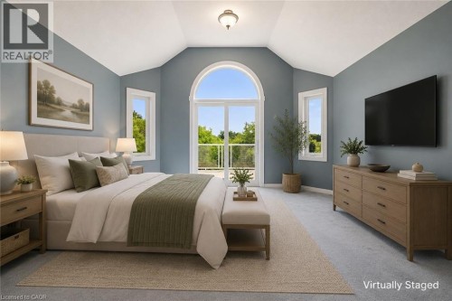 Vaulted ceiling with an arched window and two additional side windows - 426 Hidden Creek Drive, Kitchener, ON 