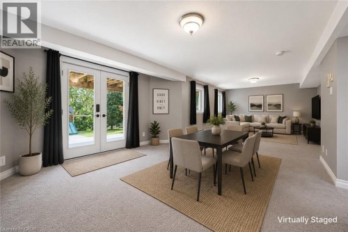 Recessed lighting, light gray carpet flooring, and white trim - 426 Hidden Creek Drive, Kitchener, ON 