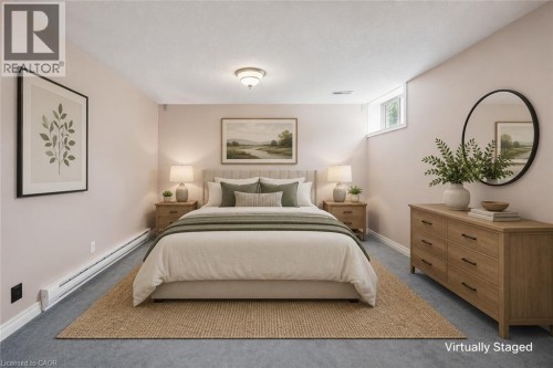 Recessed window, textured ceiling, flush mount ceiling light, wall-mounted baseboard heating, carpeted flooring - 426 Hidden Creek Drive, Kitchener, ON 