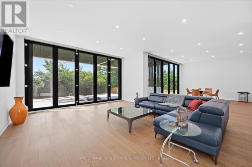 Family Room Offers Floor-To-Ceiling Bi-Fold Doors - 36 Windemere Road, Hamilton, ON 