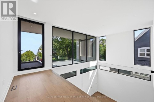 Upper Level Walkout to a Covered Balcony - 36 Windemere Road, Hamilton, ON 
