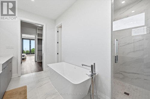 Freestanding Soaker Tub in the Primary Ensuite - 36 Windemere Road, Hamilton, ON 