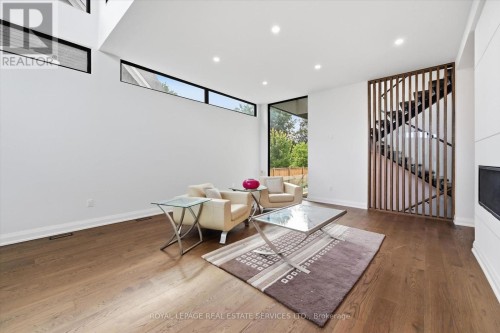 Living Room Flows Seamlessly to the Chef's Kitchen - 36 Windemere Road, Hamilton, ON 