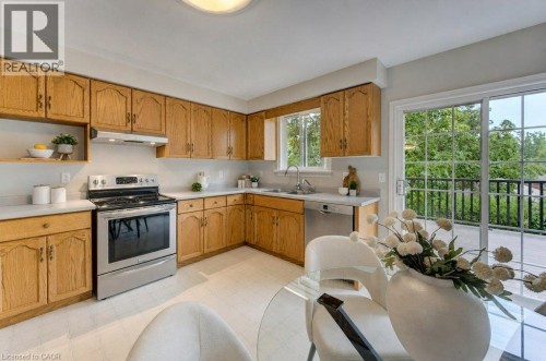 Sliding doors open to composite deck with a great view - 26 Stanmore Avenue, Kitchener, ON 