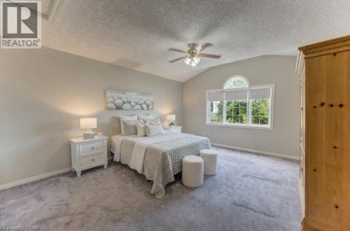 Primary bedroom -up ½ flight of stairs from main level. Vaulted ceiling - 26 Stanmore Avenue, Kitchener, ON 