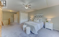 Primary bedroom - up ½ flight of stairs from main level. Vaulted ceiling - 