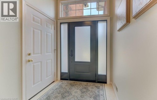 Front door and access to garage - 26 Stanmore Avenue, Kitchener, ON 