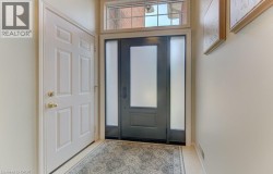 Front door and access to garage - 