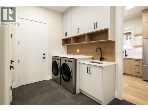 Main level laundry and mud room - 979 Loseth Drive, Kelowna, BC 