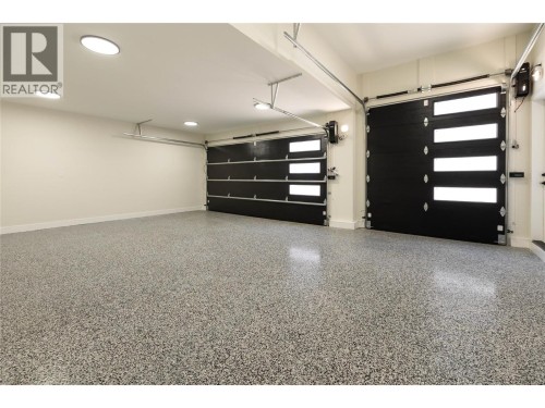 Triple garage with over sized 3rd Bay door - 979 Loseth Drive, Kelowna, BC 