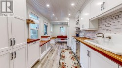 Renovated kitchen with built in eating area - 