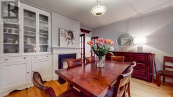 Dining room with built in cabinet and fireplace - 