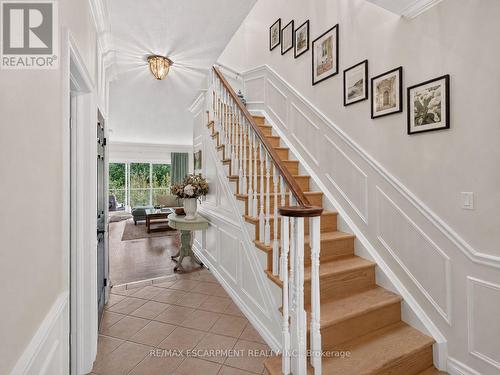 Walk-in hall closet and powder room to the left. - 112 Fairwood Place W, Burlington, ON 