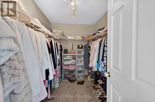 Primary walk-in closet - 112 Fairwood Place W, Burlington, ON 