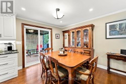 DINING ROOM WITH WALKOUT TO DECK - 