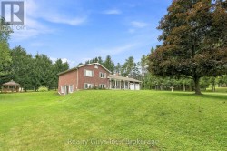 LARGER THAN APPEARS- 2 WALKOUTS , MULTI LEVEL HOME - 