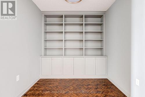 Custom bookshelves in open concept den - 509 - 17 Michael Power Place, Toronto, ON 