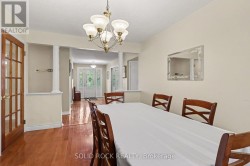 Dining room with columns opening to entrance - 