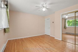 Primary bedroom with rear yard views - 