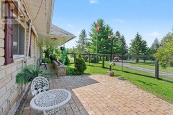 Landscaped patio area with dog run - 