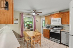 Kitchen with rear yard access to covered porch - 