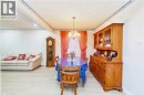 Recessed ceiling lighting, a decorative ceiling trim, light-toned wood-finish flooring, and a window with drapery - 41 Tuerr Drive, Kitchener, ON 