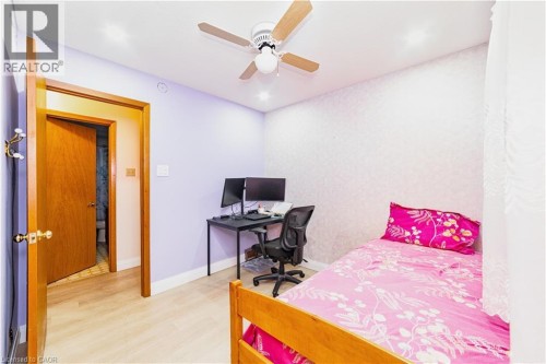 Wood-finish flooring, recessed lighting, ceiling fan, and solid core doors - 41 Tuerr Drive, Kitchener, ON 