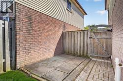 Side yard is perfect storage for garbage and green bins - 