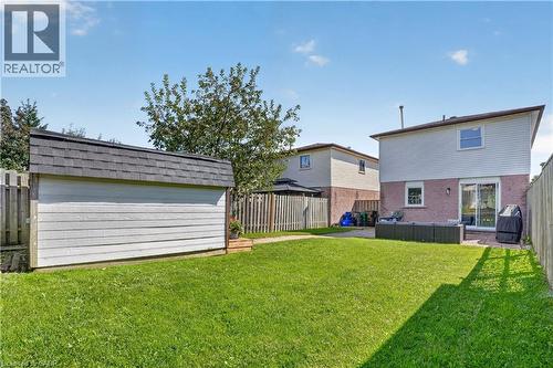 View of the home from the back of the yard - 38 Meadow Woods Crescent, Kitchener, ON 