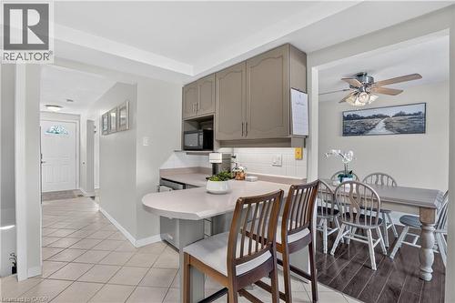 View of coffee area and breakfast bar - 38 Meadow Woods Crescent, Kitchener, ON 