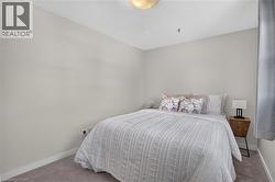Carpeted flooring and light-toned walls - 