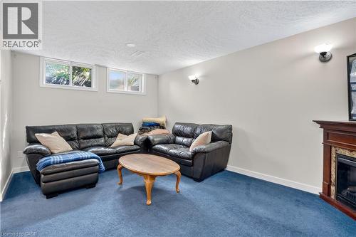 light gray walls, two wall sconces - 38 Meadow Woods Crescent, Kitchener, ON 