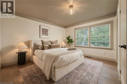 Wood-finish flooring with a neutral color palette - 571 Leonard Court, Burlington, ON 