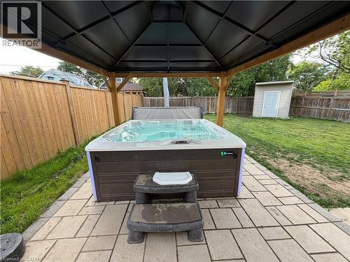 backyard with hottub and gazebo - 94 Howard Avenue, Hamilton, ON 