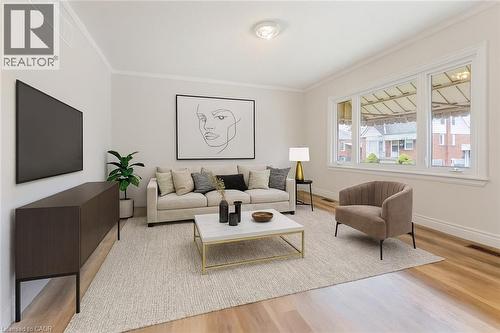 65 EAST 11TH Street Unit# Main Floor , Hamilton, Ontario L9A 3T3 4