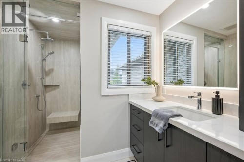 Walk-in shower with glass enclosure, built-in bench, and niche - 1261 Stephenson Drive, Burlington, ON 