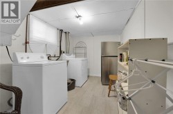 Laundry room featuring independent washer and dryer - 