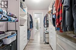 Lower level walk-through closet - 