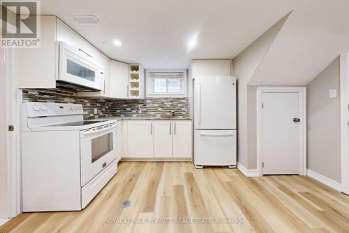 C - 73 GORT AVENUE , Toronto, Ontario M8W 3Y9 2